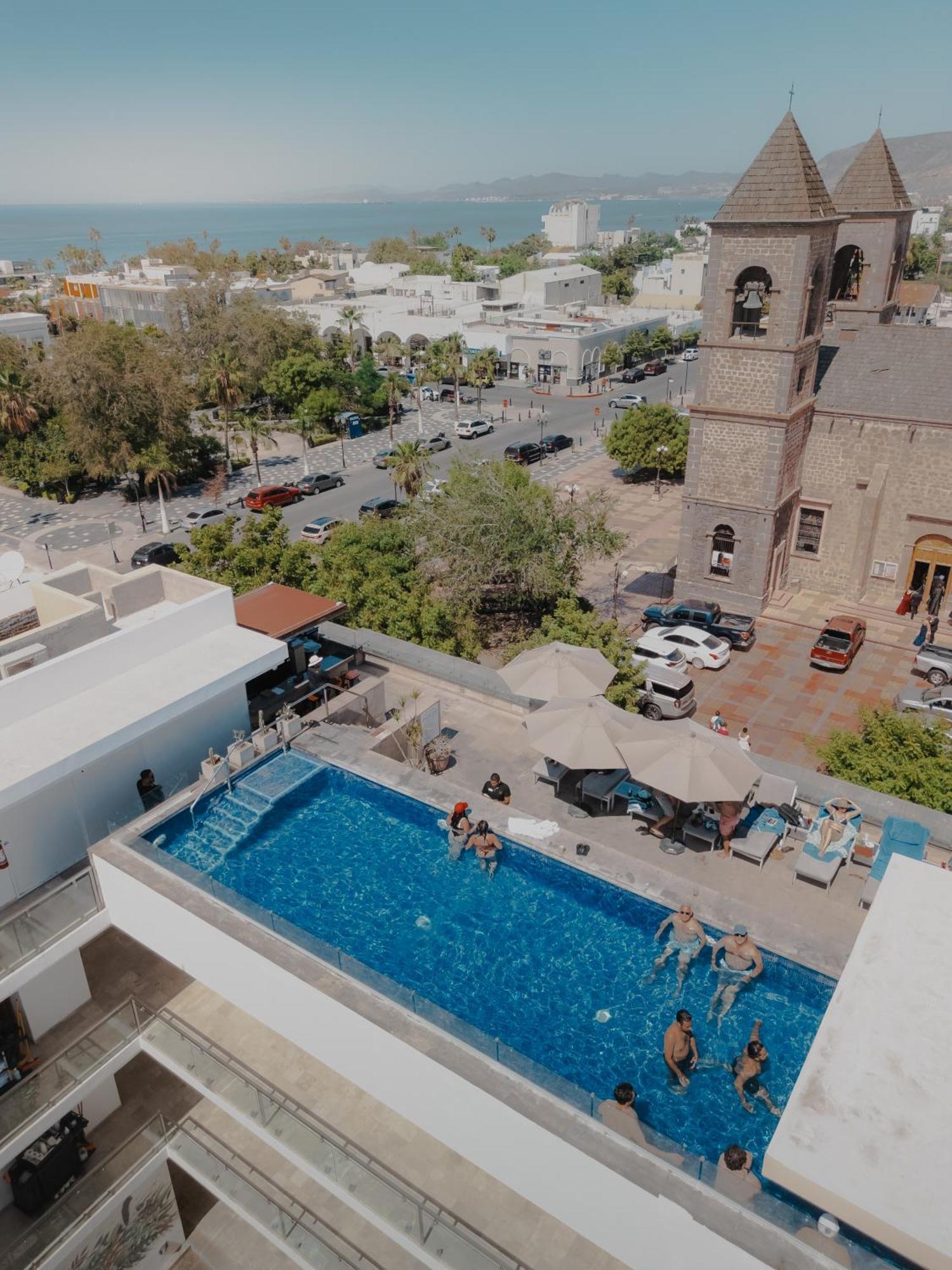 Hotel Catedral La Paz Esterno foto Aerial view of the rooftop pool at the Hotel Indigo, Perth